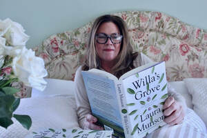 Author Laura Munson in bed