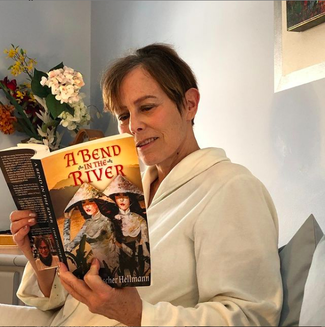 Author Libby Fischer Hellmann in bed