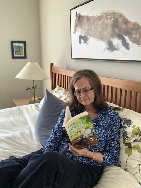 Author Helen Starbuck in bed